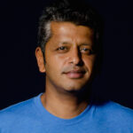 Srini Rao, standing in the beach shadows... - BambooHR Ireland | A Grouper Technology Division